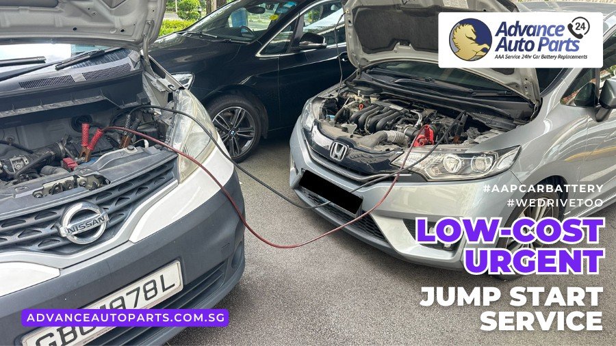 AAP mechanic performing urgent car jump start service onsite in Singapore